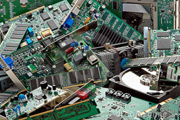 used-broken-computer-parts-discarded-trash-pile-12450829